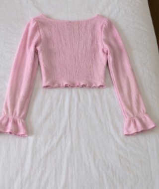 Blusa rosa manga larga con volantes