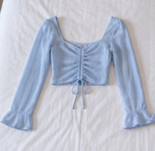 Blusa azul manga larga fruncida