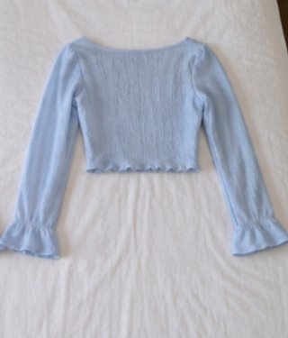 Blusa azul manga larga fruncida
