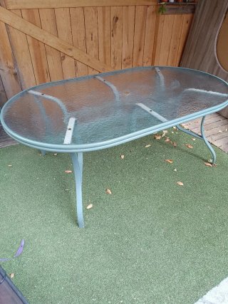 Mesa de jardín ovalada cristal y metal