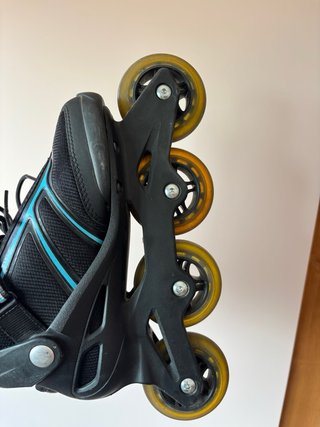 Patines en línea Rollerblade negros y turquesa