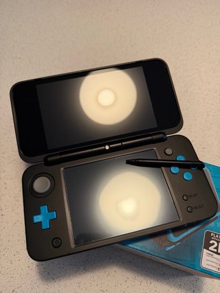 Nintendo 2DS XL Negra y Azul IMPOLUTA