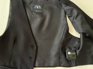 Chaleco negro traje mujer