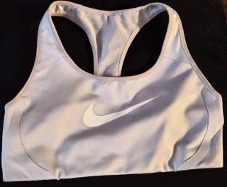 Top deportivo Nike XS gris
