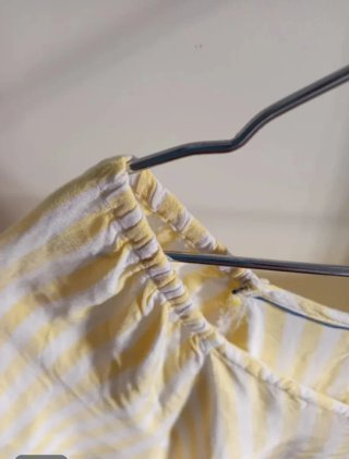 Blusa de rayas amarillas y blancas