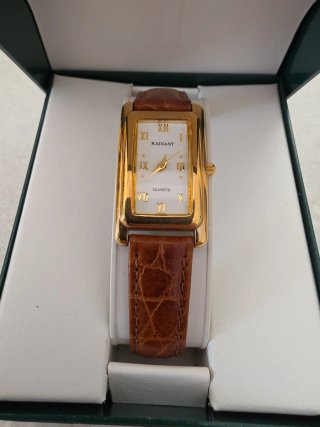 Reloj Radiant La Caixa Dorado