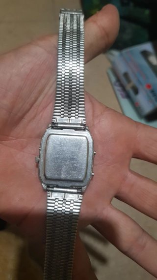 Reloj Timex Q 1982. Anadigi Negro y Plateado