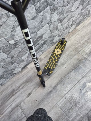 Patinete PRO SCOOTER dorado y negro