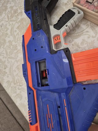 Pistola Nerf Azul y Naranja