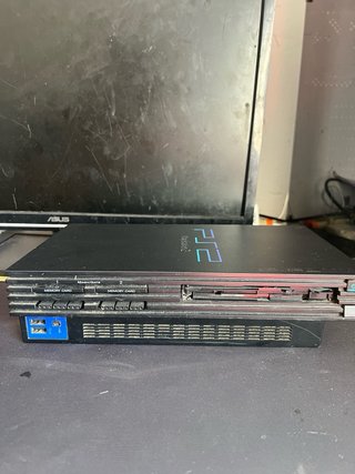 Consola PlayStation 2 Fat con Mando y 16 Juegos