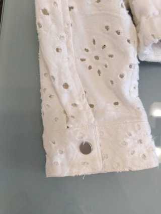 Chaqueta blanca calada niña