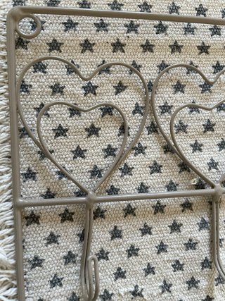 Colgador de pared con corazones