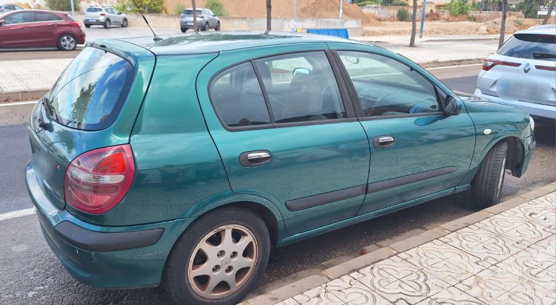 Nissan Almera 2001 - foto 1