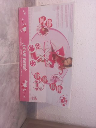 Cochecito de muñecas rosa