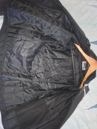 Chaqueta Dainese Moto Deportiva Negra/Blanca.