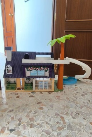 Casa de muñecas Mymy City con tobogán