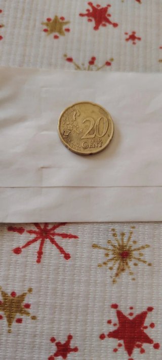 20 céntimos España 1999 error metal