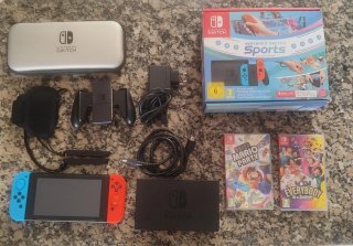 Nintendo Switch + Juegos y Accesorios
