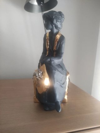 Figura cerámica Nadal negra dorada