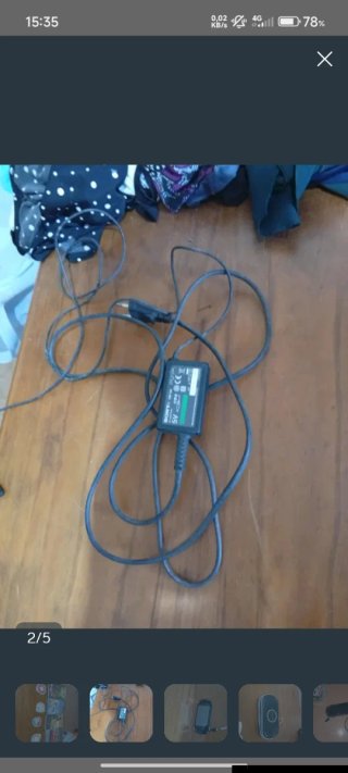 PSP Slim modello 2004 + 8 Giochi + Caricatore + Custodia