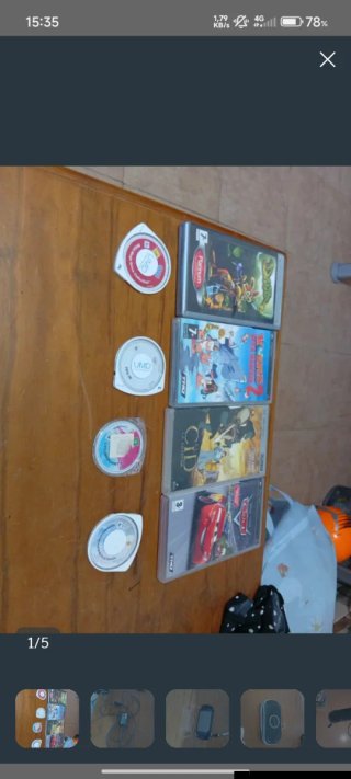 PSP Slim modello 2004 + 8 Giochi + Caricatore + Custodia