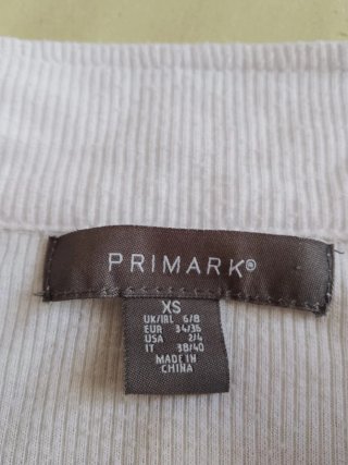 Camiseta blanca cuello polo Primark Talla M