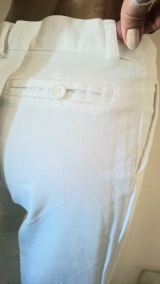 Pantaloni bianchi a zampa tg. M