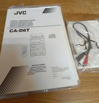Equipo de música JVC con 5 altavoces y mando