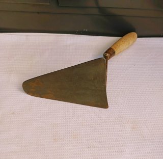 Plomada y paletas de albañil