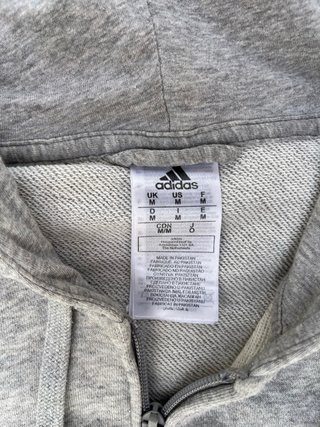 Sudadera Adidas gris y negra con capucha