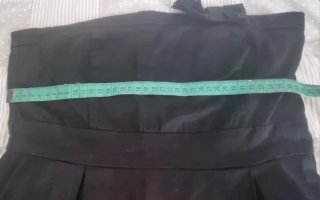 Vestido negro palabra de honor con lazo