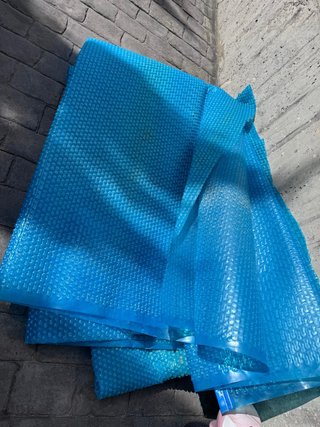 Manta piscina doble burbuja con ojales
