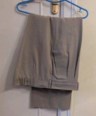 Pantalones de pinzas beige talla 44