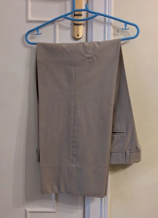 Pantalones de pinzas beige talla 44
