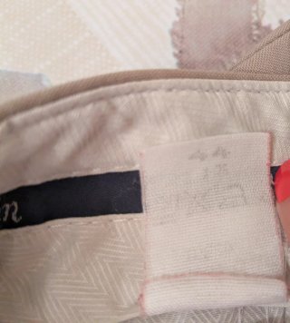 Pantalones de pinzas beige talla 44