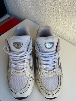 Zapatillas Dior grises y blancas