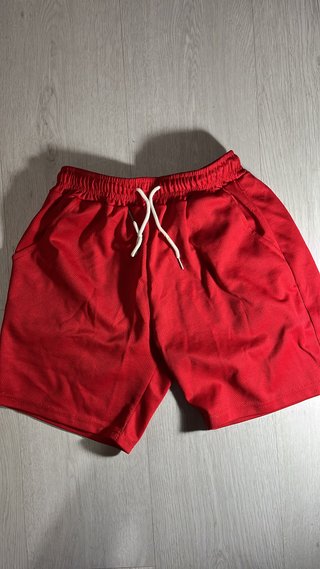 Pantalón corto chándal rojo con bolsillos