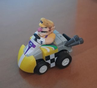Microcoche Wario Fricción Coleccionable