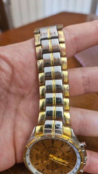Orologio uomo lusso color argento e oro