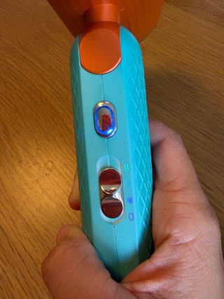 Secador de pelo VR naranja y turquesa