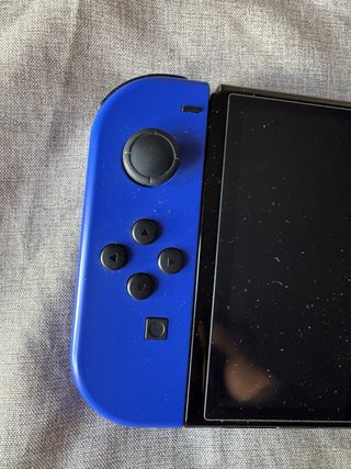 Nintendo Switch OLED Azul y Verde + funda