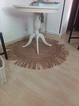 Alfombra redonda de yute con flecos