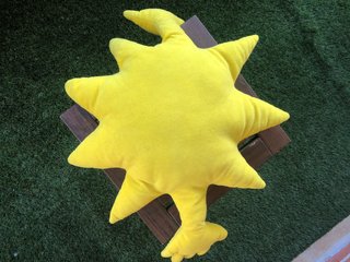 Cojín divertido de sol