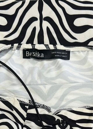 Vestido Breskar Animal Print Negro y Blanco