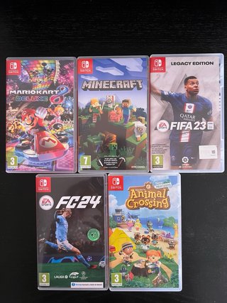 Nintendo Switch OLED + 5 juegos + 2 mandos