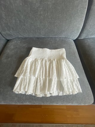Mini falda blanca volantes