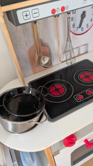 Cocina de juguete de madera y plástico