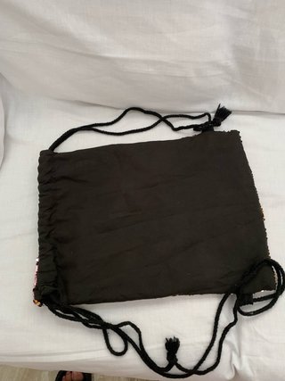 Mochila de lentejuelas doradas y rosas