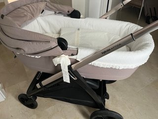 Carrito, silla y capazo con sacos