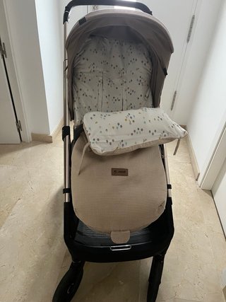 Carrito, silla y capazo con sacos